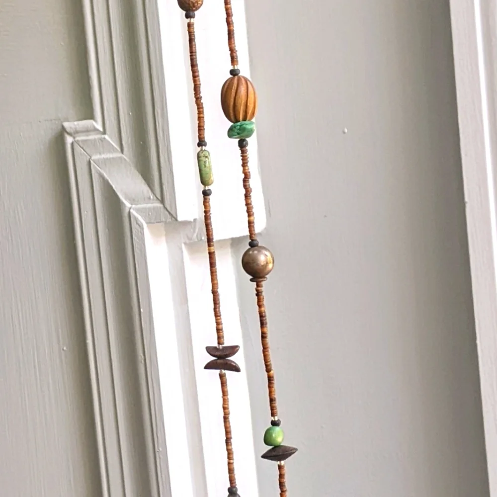 Wooden beads, real stones, and mixed metals long strand Boho necklace